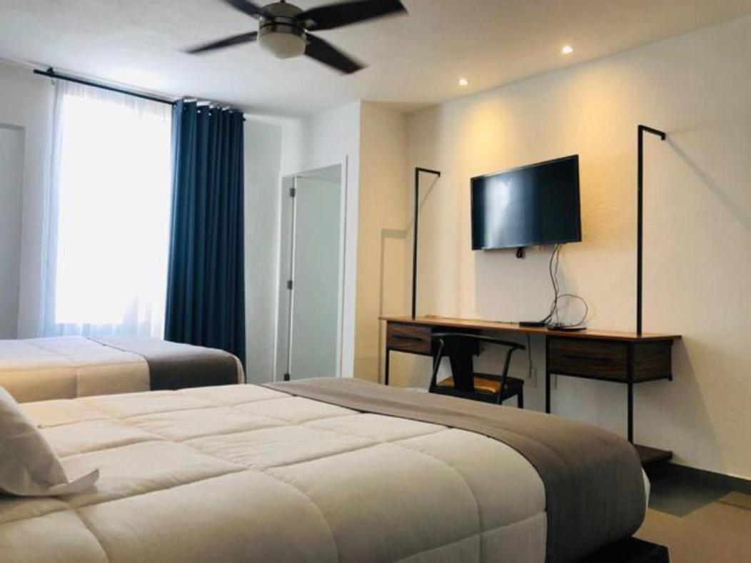 Aparthotel Urban Gran Plaza Zapopan Esterno foto